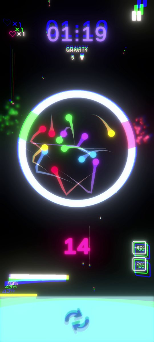 A ring with pink and green exits and over a dozen balls in play